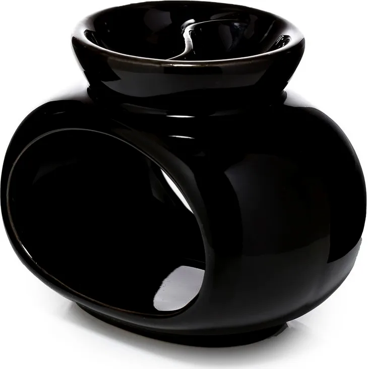 Czarny ceramiczny kominek na wosk zapachowy o organicznej formie, który równomiernie topi wosk i subtelnie uwalnia aromat w nowoczesnym wnętrzu.