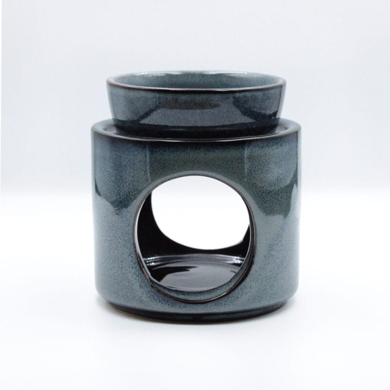 Niebieski ceramiczny kominek na wosk zapachowy widok z przodu